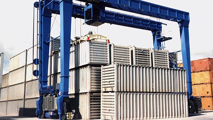 Isoloader Rubber Tired Gantries (RTG) provide cost-effective high density containeried surge capacity for storage of chemicals.