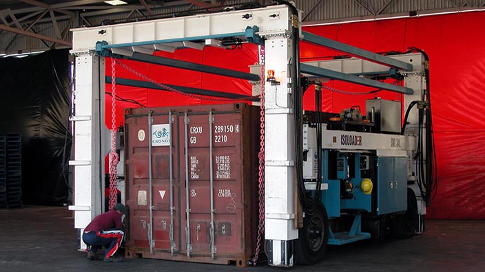 Isoloader Econolifter Straddle Carriers with telescoping masts for low height clearances for container handling in warehouses